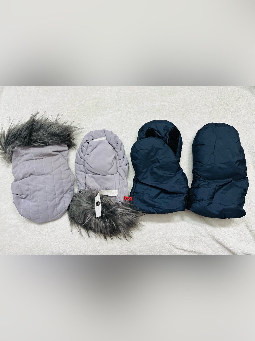 Lot Stroller Muffs keep hands warm while pushing a stroller in cold weather